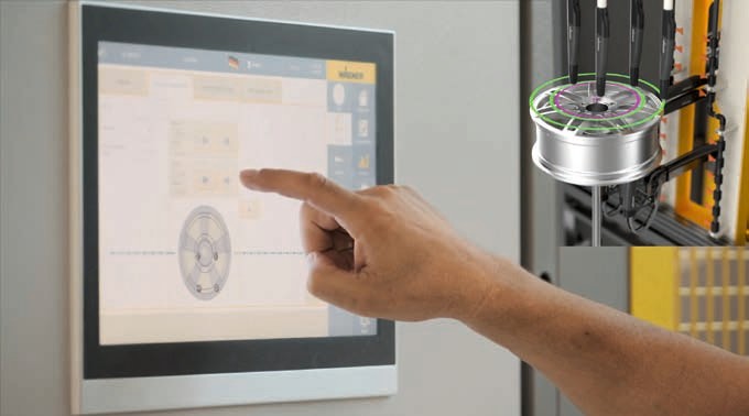 專為汽車輪轂開發(fā)的粉末噴涂系統(tǒng)，通過觸摸屏進行系統(tǒng)配置和控制